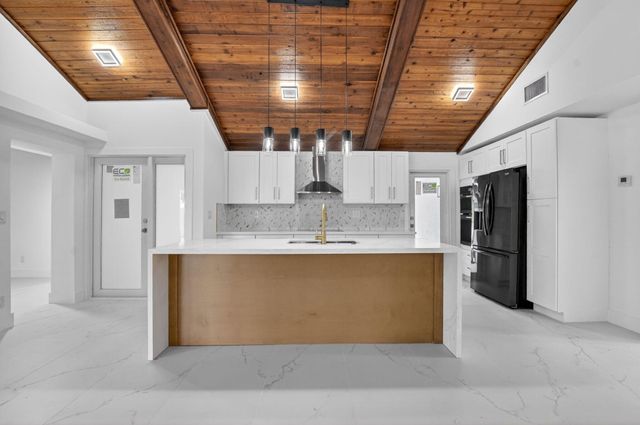 4701 NW 1st Place, Deerfield Beach, FL 33442