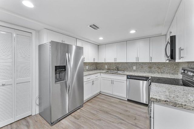 16475 Golf Club Road 207, Weston, FL 33326