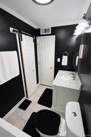 6101 Woodsdale Drive, Grand Blanc, MI 48439