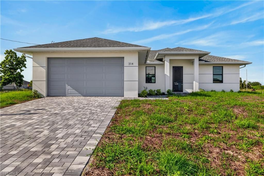 314 NW 20th TER, CAPE CORAL, FL 33993 — exterior