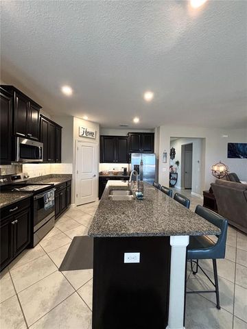 16840 WHISPER ELM STREET, Wimauma, FL 33598