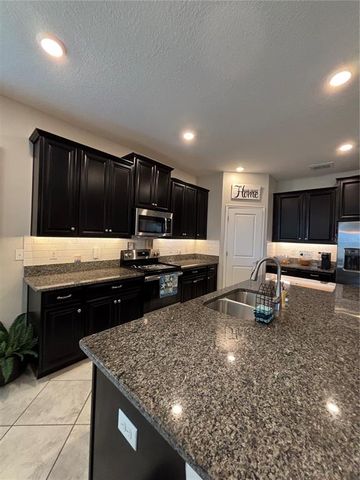 16840 WHISPER ELM STREET, Wimauma, FL 33598