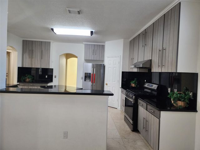 12303 Doe Meadow Drive, Stafford, TX 77477