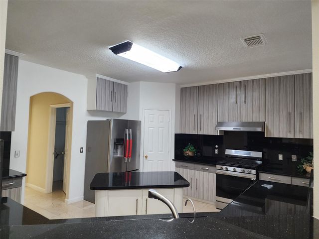 12303 Doe Meadow Drive, Stafford, TX 77477