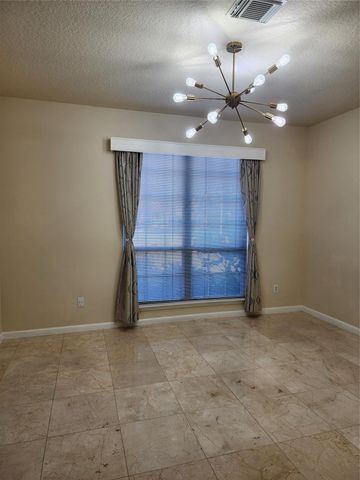 12303 Doe Meadow Drive, Stafford, TX 77477