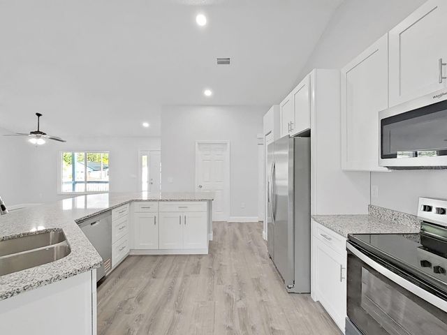 10328 RAINBOW OAKS DRIVE, Hudson, FL 34667