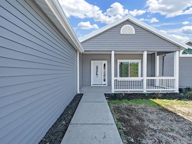 10328 RAINBOW OAKS DRIVE, Hudson, FL 34667