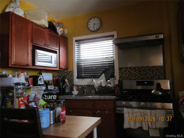 94-10 82nd Place, Ozone Park, NY 11416