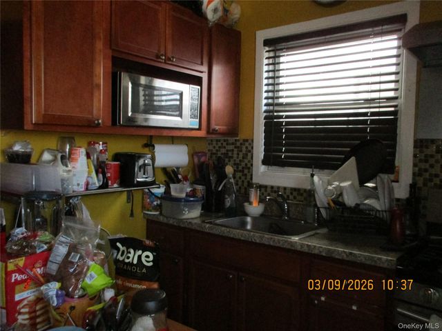 94-10 82nd Place, Ozone Park, NY 11416