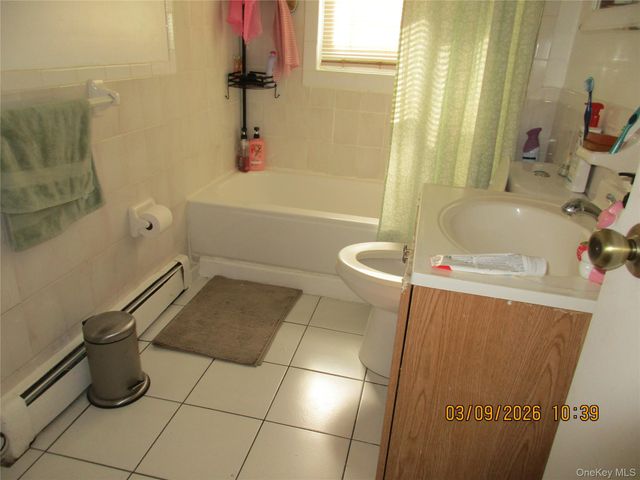 94-10 82nd Place, Ozone Park, NY 11416