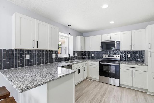 1130 SW Eastman Court, Blue Springs, MO 64015