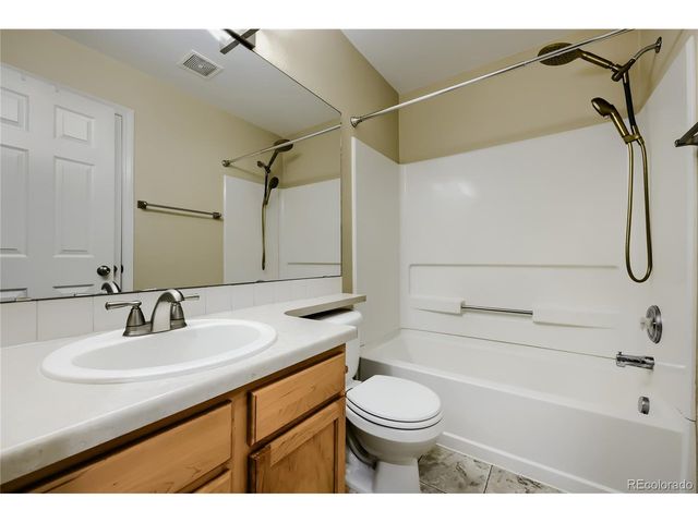 9493 Longs Peak Dr, Commerce City, CO 80640