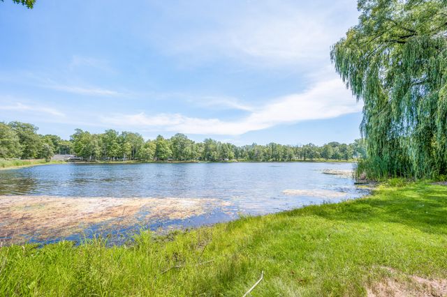 7746 N Manitonka Drive, Weidman, MI 48893