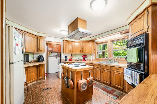 7746 N Manitonka Drive, Weidman, MI 48893