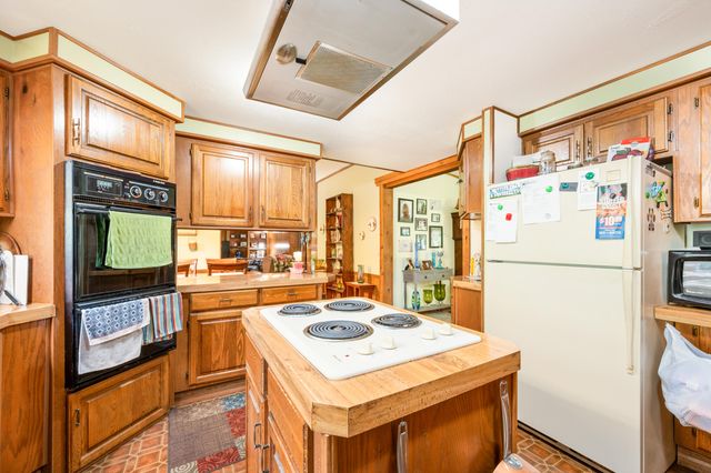 7746 N Manitonka Drive, Weidman, MI 48893