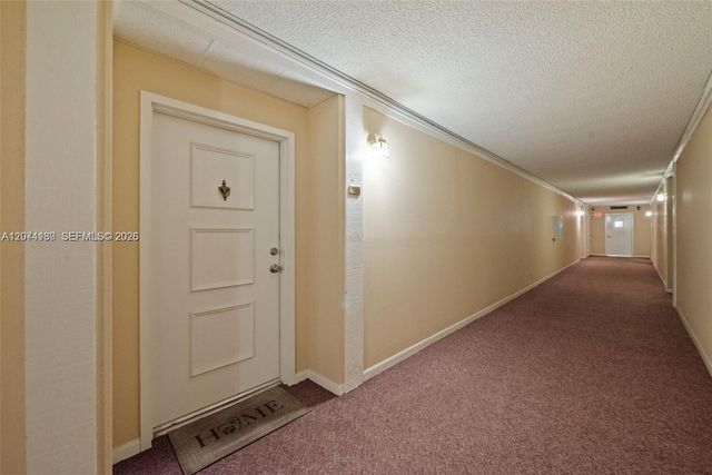 301 Racquet Club Road 104, Weston, FL 33326