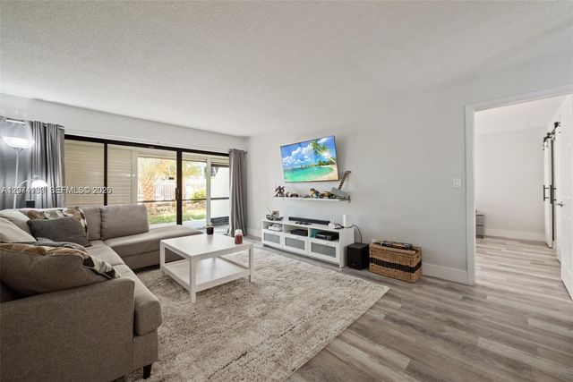 301 Racquet Club Road 104, Weston, FL 33326