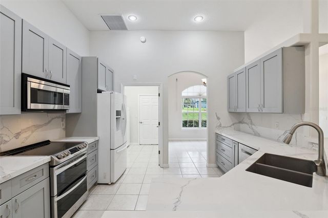 10308 CALLE DE FLORES DRIVE, Clermont, FL 34711