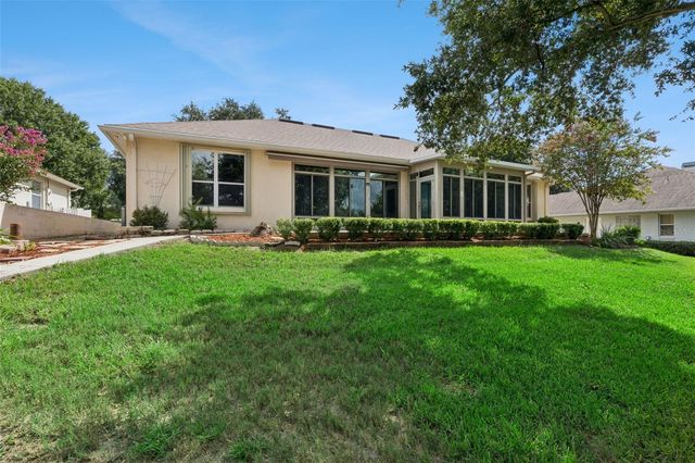 10308 CALLE DE FLORES DRIVE, Clermont, FL 34711
