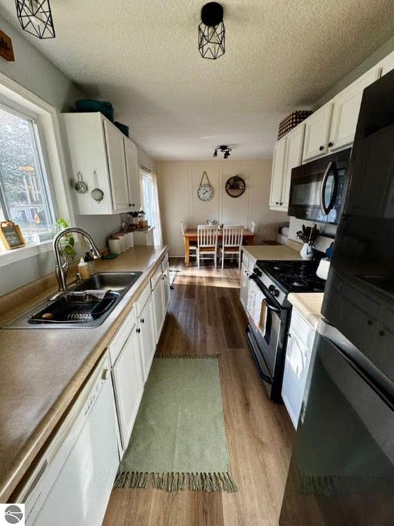 Image 2 of property listing at 9383 First Street, Interlochen, MI 49643