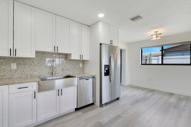 9291 Bloomfield Drive, Palm Beach Gardens, FL 33410