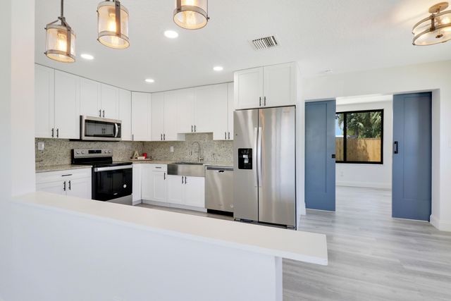9291 Bloomfield Drive, Palm Beach Gardens, FL 33410
