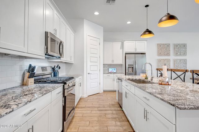 17140 W WHISPERING WIND Drive, Surprise, AZ 85387