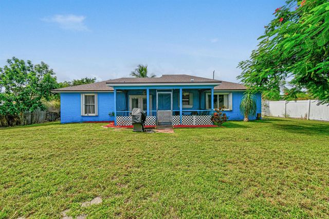 767 SE Chaloupe Avenue, Port St. Lucie, FL 34983