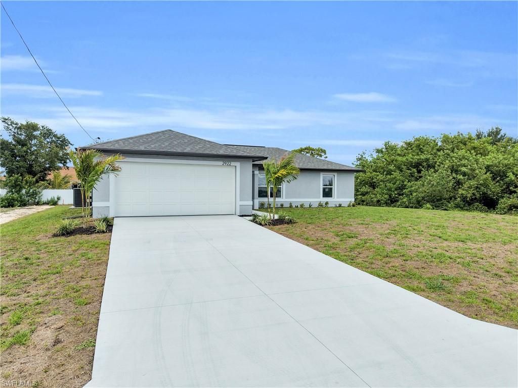 310 NE 9th TER, CAPE CORAL, FL 33909 — photo 3