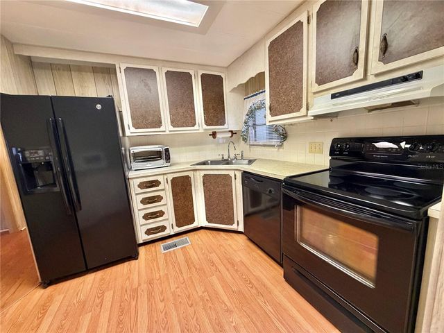 211 ASPEN CIRCLE, Leesburg, FL 34748