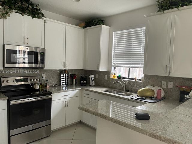 9602 S Town Parc Cir S 9602, Parkland, FL 33076