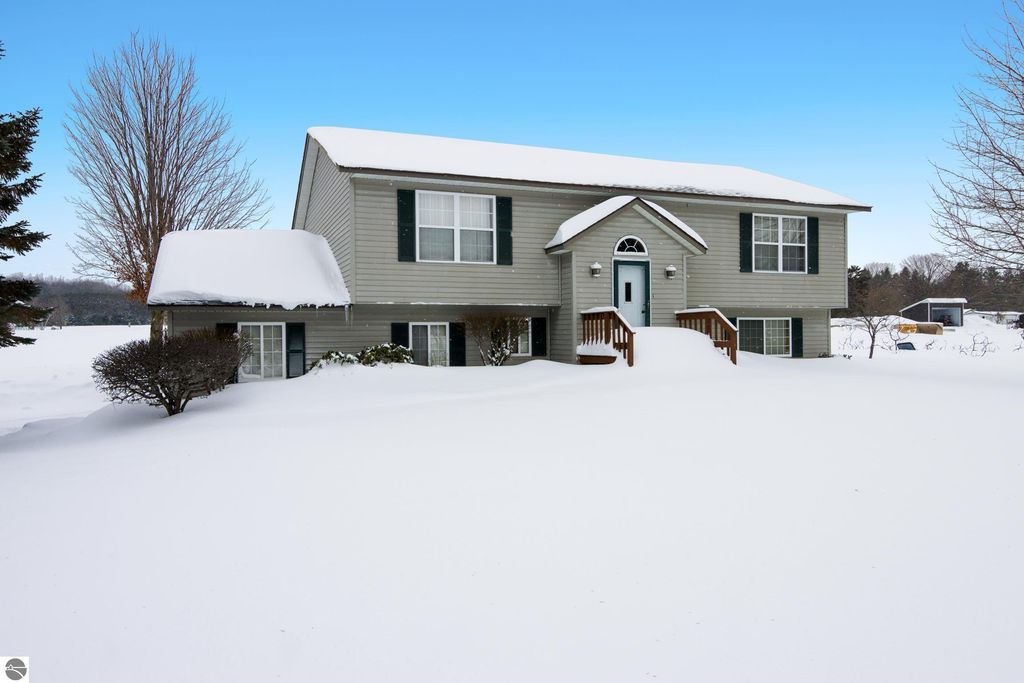 Image 2 of property listing at 1199 W Intermediate Lake Drive, Central Lake, MI 49622