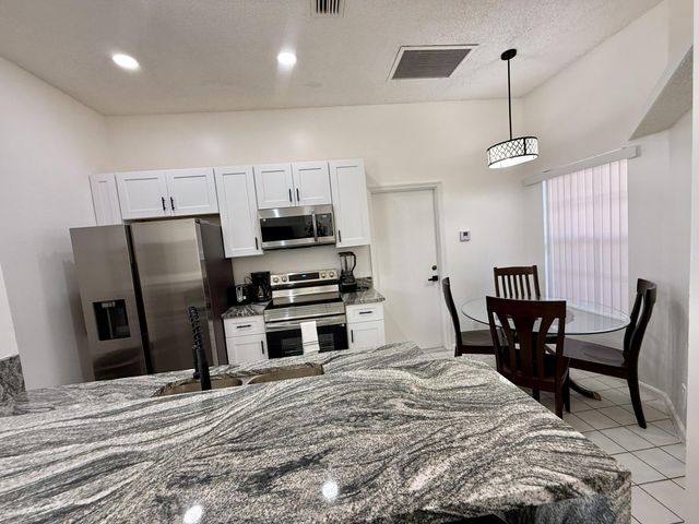 1049 Mourning Dove Lane, Wellington, FL 33414