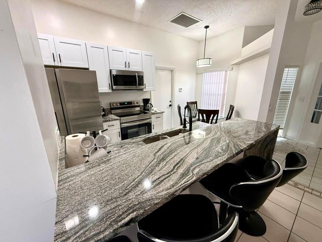 1049 Mourning Dove Lane, Wellington, FL 33414