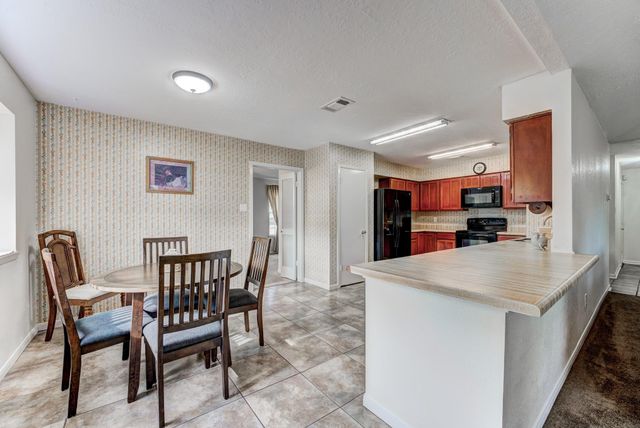 8514 Sugar Wood Court, Humble, TX 77338