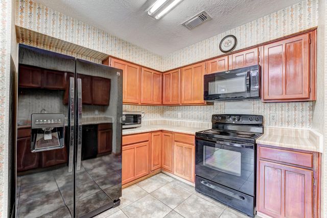 8514 Sugar Wood Court, Humble, TX 77338