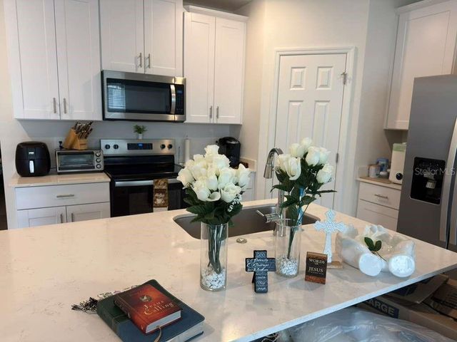 16306 BIRD OF PARADISE AVENUE, Clermont, FL 34714