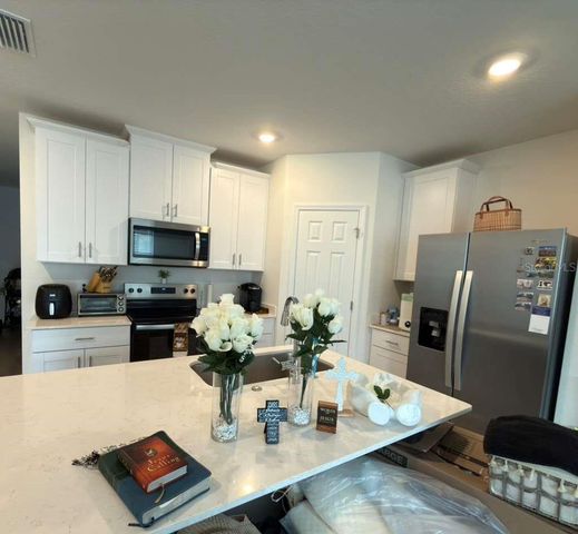 16306 BIRD OF PARADISE AVENUE, Clermont, FL 34714