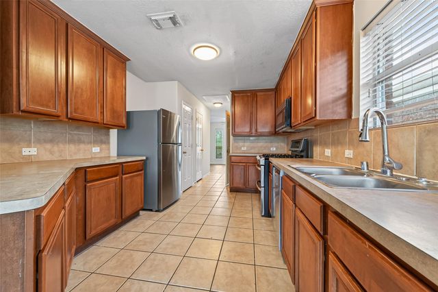 9127 N Ferndale Place Drive, Houston, TX 77064