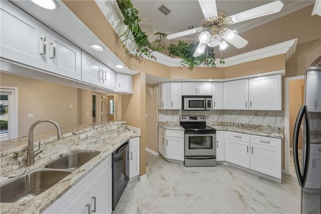 128 Heritage WAY, Naples, FL 34110