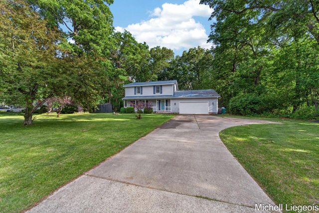3325 S Riverwood Drive, Twin Lake, MI 49457