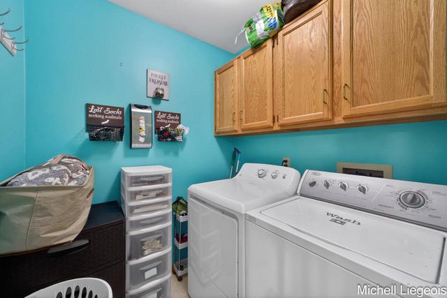 3325 S Riverwood Drive, Twin Lake, MI 49457