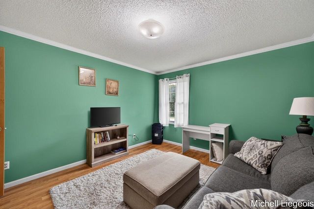 3325 S Riverwood Drive, Twin Lake, MI 49457