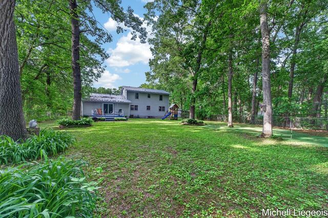 3325 S Riverwood Drive, Twin Lake, MI 49457