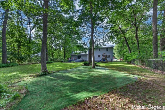 3325 S Riverwood Drive, Twin Lake, MI 49457