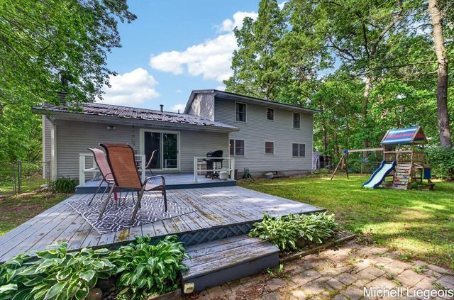3325 S Riverwood Drive, Twin Lake, MI 49457