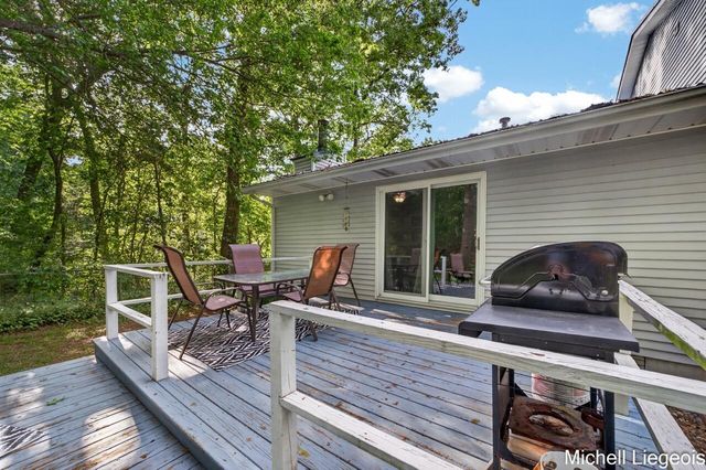 3325 S Riverwood Drive, Twin Lake, MI 49457