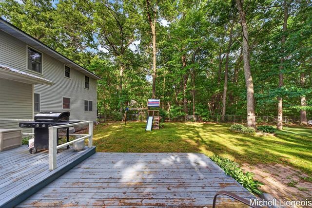 3325 S Riverwood Drive, Twin Lake, MI 49457