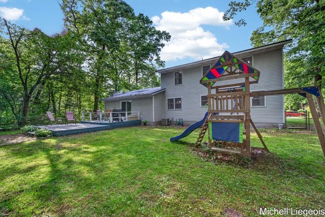 3325 S Riverwood Drive, Twin Lake, MI 49457