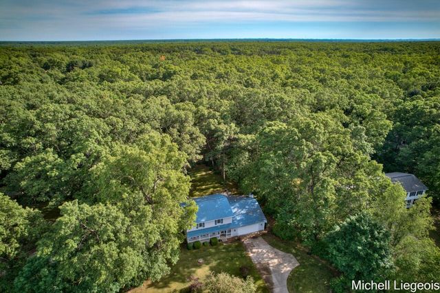 3325 S Riverwood Drive, Twin Lake, MI 49457